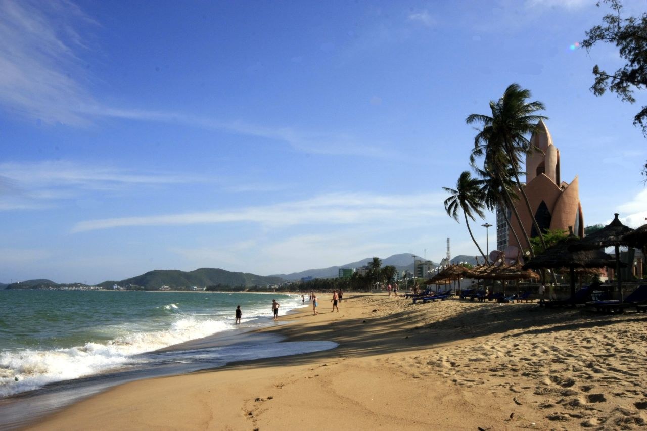 Nha Trang coastline with Tram Huong Tower in the distance