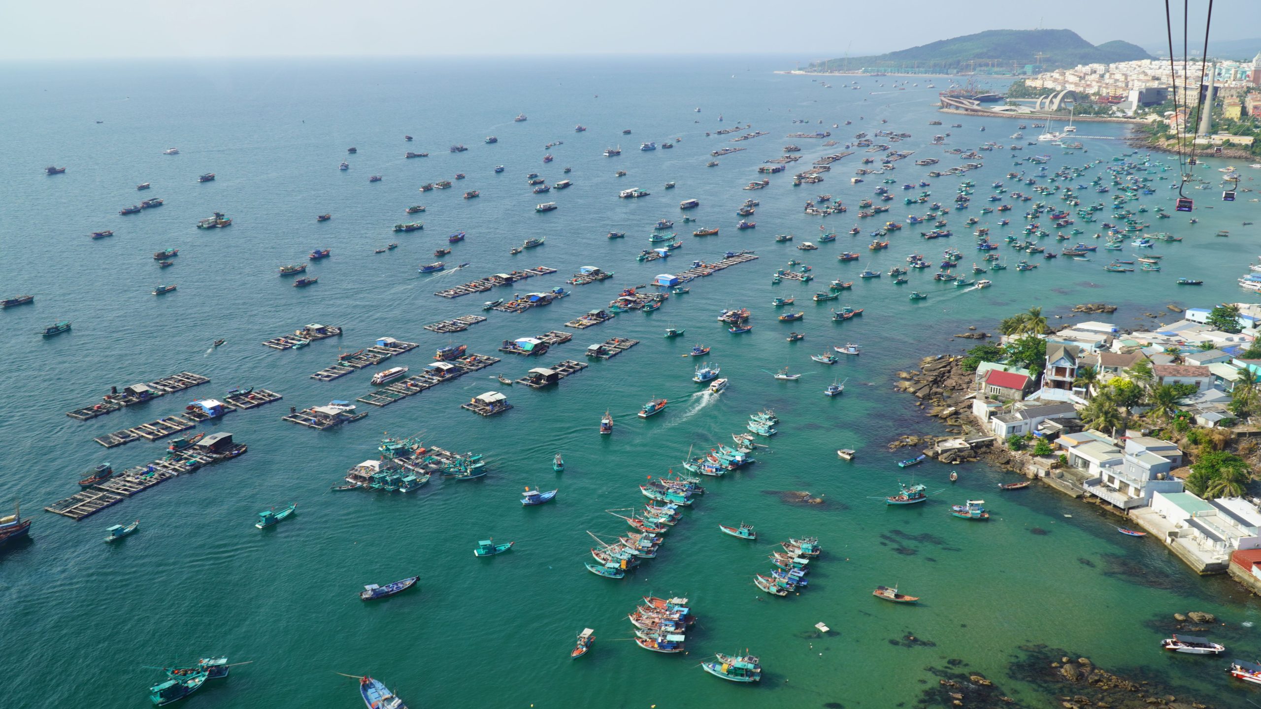 Fishing boats moored at a port in Phu Quoc from above